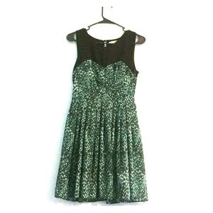 Green and white patterned dress